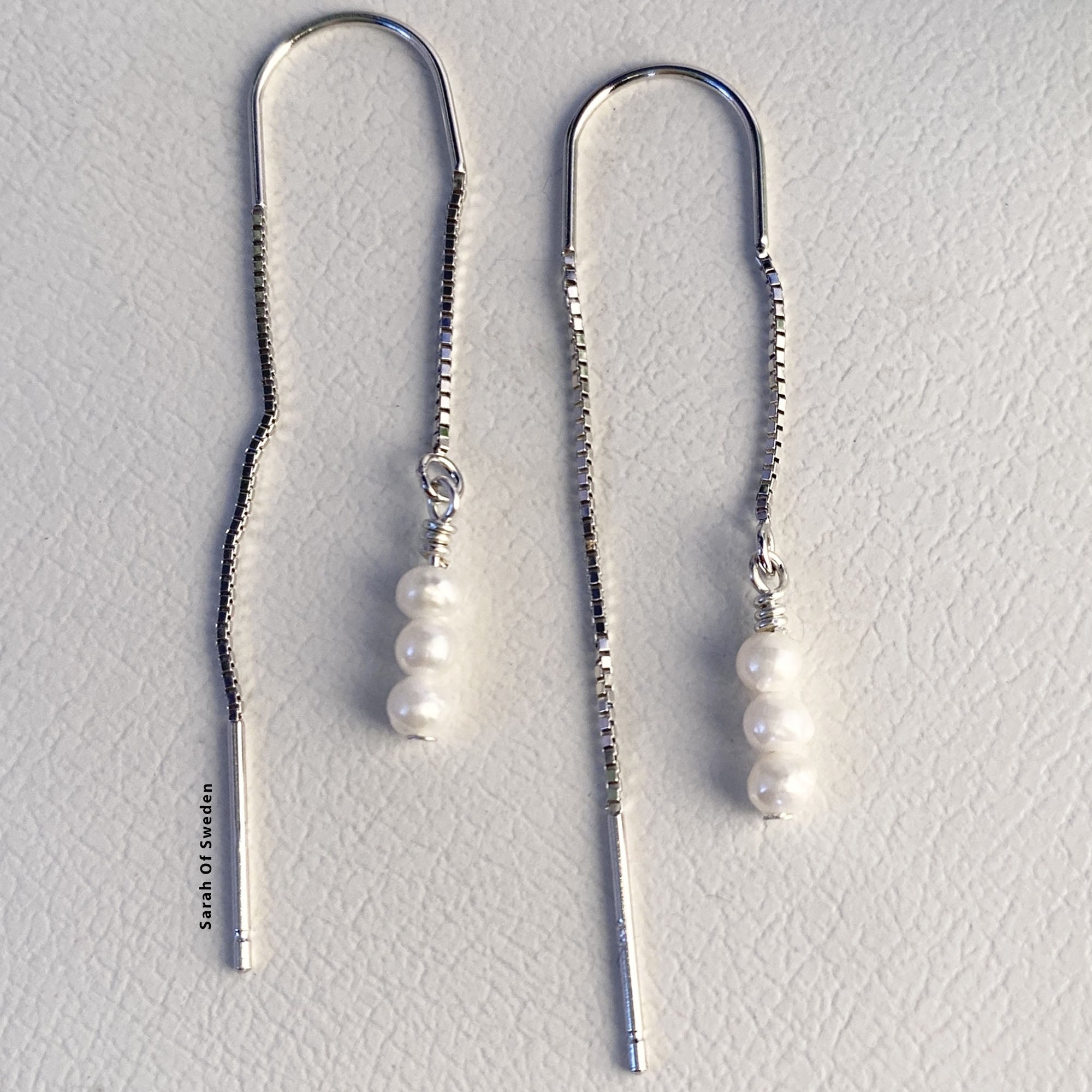 Trendiga halvlånga silverörhängen sötvattenpärla kedja dra igenom örat