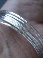 Armring med hamrad yta äkta silver