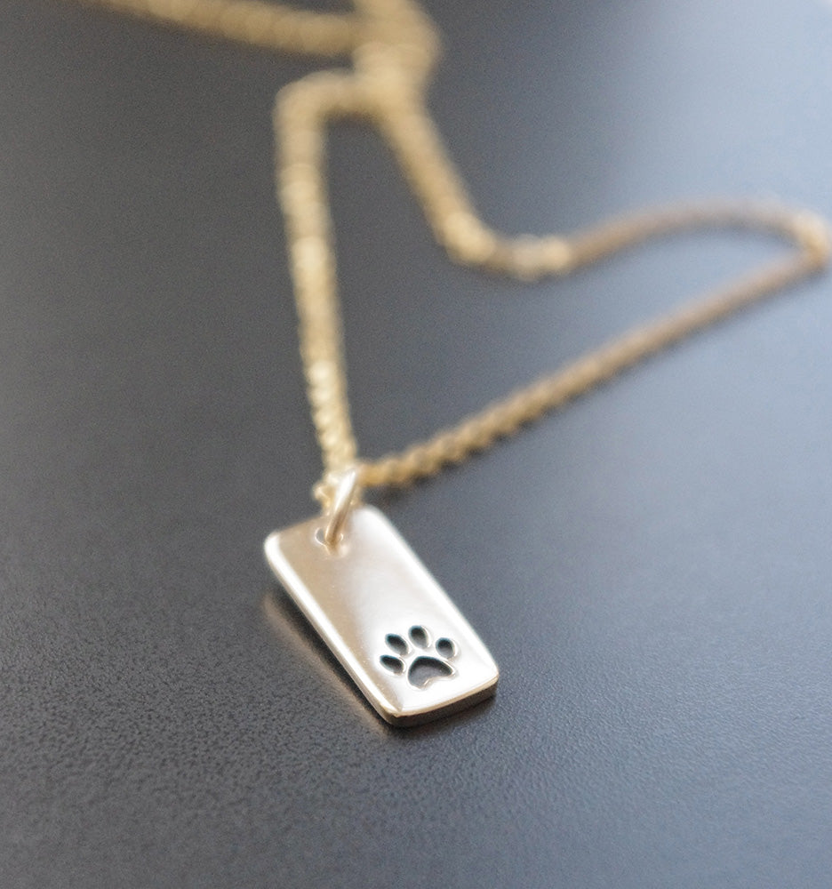 katt tass halsband i brons